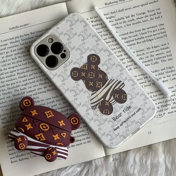 قاب موبایل آیفون خرس راه راه زبرا محافظ لنزدار + بند سیلیکونی