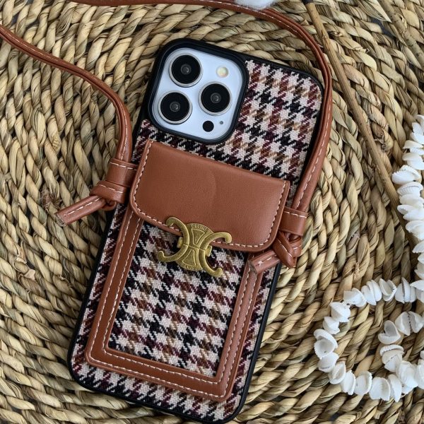 قاب موبایل آیفون پارچه ای و فلزی طرح باربری جاکارتی + بندست