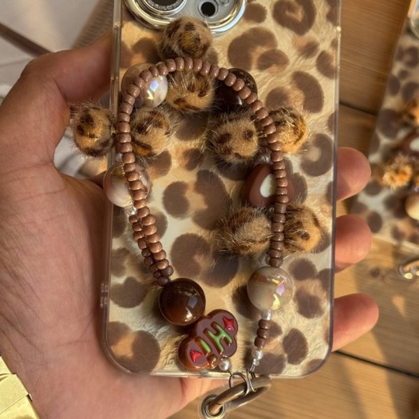 قاب موبایل آیفون چشم پلنگی شاینی + بندست