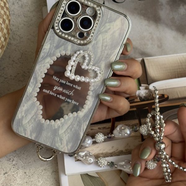 قاب موبایل آیفون قلب رمانتیک آیینه ای نگین دار + بندست