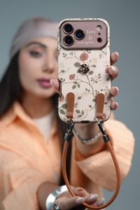 قاب موبایل ( آیفون - سامسونگ ) گل رز فلورا قهوه ای + بندست چرمی - تصویر 4